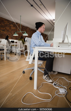 To use this stock image in your creative project, please select the size you need over to the right and click the "Add to Cart" button.
Your downloaded image will come with the Cutcaster watermark removed so don’t worry about the watermark you see on this page. Executive working on computer in office stock photo, Attentive executive working on computer in office by Wavebreak Media