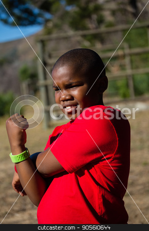 To use this stock image in your creative project, please select the size you need over to the right and click the "Add to Cart" button.
Your downloaded image will come with the Cutcaster watermark removed so don’t worry about the watermark you see on this page. Boy performing stretching exercise during obstacle course training stock photo, Boy performing stretching exercise during obstacle course training in the boot camp by Wavebreak Media