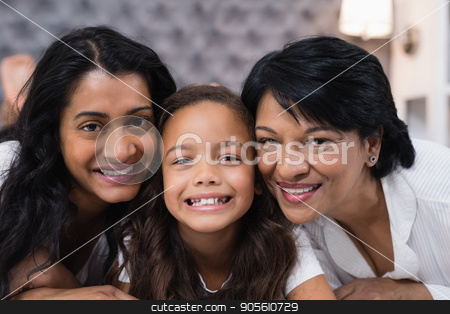 To use this stock image in your creative project, please select the size you need over to the right and click the "Add to Cart" button.
Your downloaded image will come with the Cutcaster watermark removed so don’t worry about the watermark you see on this page. Portrait of multi-generation family at home stock photo, Close up portrait of multi-generation family at home by Wavebreak Media