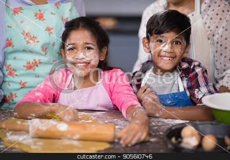 To use this stock image in your creative project, please select the size you need over to the right and click the "Add to Cart" button.
Your downloaded image will come with the Cutcaster watermark removed so don’t worry about the watermark you see on this page. Portrait of smiling siblings with flour on face at home stock photo, Portrait of smiling siblings with flour on face standing in kitchen at home by Wavebreak Media