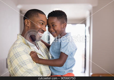 To use this stock image in your creative project, please select the size you need over to the right and click the "Add to Cart" button.
Your downloaded image will come with the Cutcaster watermark removed so don’t worry about the watermark you see on this page. Father and son looking at each other in living room stock photo, Happy father and son looking at each other in living room by Wavebreak Media