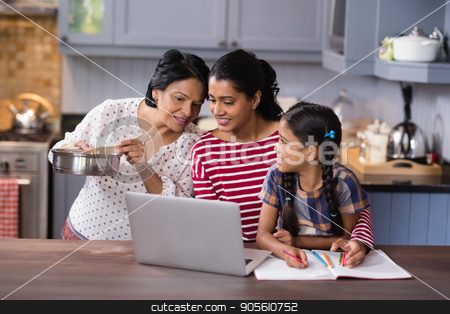 To use this stock image in your creative project, please select the size you need over to the right and click the "Add to Cart" button.
Your downloaded image will come with the Cutcaster watermark removed so don’t worry about the watermark you see on this page. Multi-generation family using laptop in kitchen stock photo, Multi-generation family using laptop in kitchen at home by Wavebreak Media