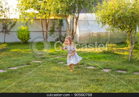 To use this stock image in your creative project, please select the size you need over to the right and click the "Add to Cart" button.
Your downloaded image will come with the Cutcaster watermark removed so don’t worry about the watermark you see on this page. Cute little girl is playing in summer park stock photo, Cute little girl is playing in summer park by Satura86