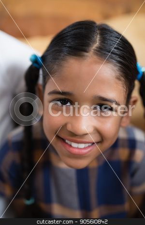 To use this stock image in your creative project, please select the size you need over to the right and click the "Add to Cart" button.
Your downloaded image will come with the Cutcaster watermark removed so don’t worry about the watermark you see on this page. High angle portrait of smiling girl stock photo, High angle portrait of smiling girl at home by Wavebreak Media