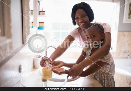 To use this stock image in your creative project, please select the size you need over to the right and click the "Add to Cart" button.
Your downloaded image will come with the Cutcaster watermark removed so don’t worry about the watermark you see on this page. Smiling mother assisting daughter while washing hands in bathroom at home stock photo, Portrait of smiling mother assisting daughter while washing hands in bathroom at home by Wavebreak Media