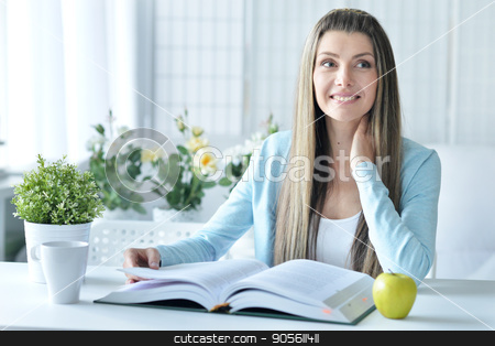 To use this stock image in your creative project, please select the size you need over to the right and click the "Add to Cart" button.
Your downloaded image will come with the Cutcaster watermark removed so don’t worry about the watermark you see on this page. young woman with opened book stock photo, Portrait of beautiful young woman with opened book by Ruslan Huzau