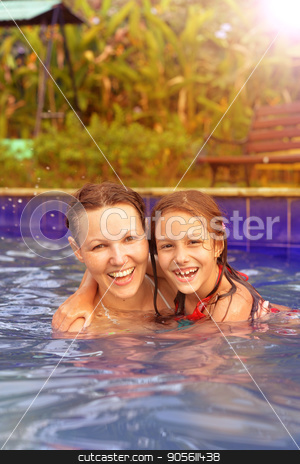 To use this stock image in your creative project, please select the size you need over to the right and click the "Add to Cart" button.
Your downloaded image will come with the Cutcaster watermark removed so don’t worry about the watermark you see on this page. Mother and daughter in swimming pool stock photo, Mother and daughter having fun in swimming pool by Ruslan Huzau