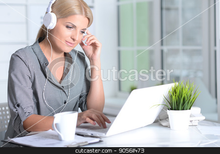 To use this stock image in your creative project, please select the size you need over to the right and click the "Add to Cart" button.
Your downloaded image will come with the Cutcaster watermark removed so don’t worry about the watermark you see on this page. woman working with laptop stock photo, Blonde young woman working with a laptop by Ruslan Huzau