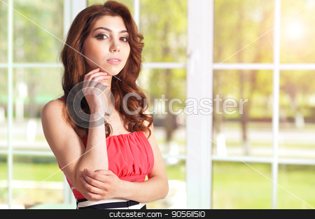To use this stock image in your creative project, please select the size you need over to the right and click the "Add to Cart" button.
Your downloaded image will come with the Cutcaster watermark removed so don’t worry about the watermark you see on this page. Beautiful young woman with digital tablet stock photo, Portrait of beautiful young woman with curly hair by Ruslan Huzau