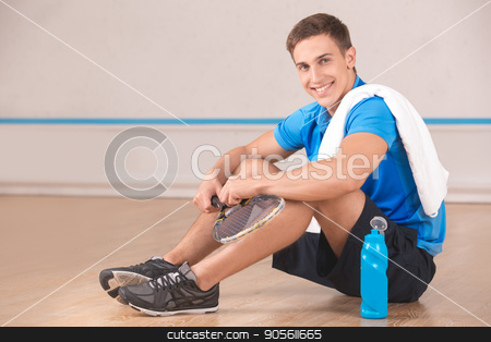 To use this stock image in your creative project, please select the size you need over to the right and click the "Add to Cart" button.
Your downloaded image will come with the Cutcaster watermark removed so don’t worry about the watermark you see on this page. Young man squash player break rest in the gym stock photo, Young man rest in the gym squash game play by Dmytro Sidelnikov