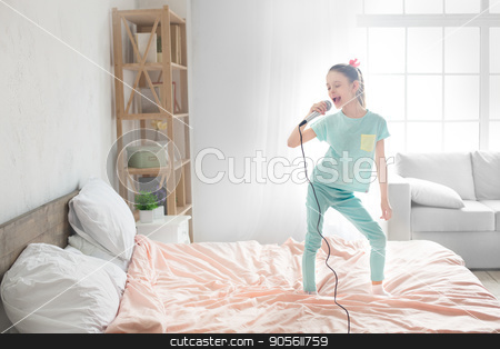 To use this stock image in your creative project, please select the size you need over to the right and click the "Add to Cart" button.
Your downloaded image will come with the Cutcaster watermark removed so don’t worry about the watermark you see on this page. Young teenager girl alone at home childhood stock photo, Young teenager girl alone at home childhood singing by Dmytro Sidelnikov
