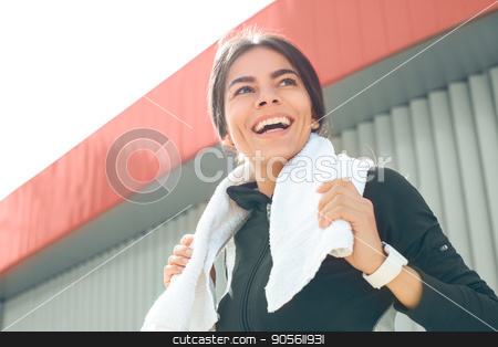 To use this stock image in your creative project, please select the size you need over to the right and click the "Add to Cart" button.
Your downloaded image will come with the Cutcaster watermark removed so don’t worry about the watermark you see on this page. Young woman active exercise workout on street outdoor stock photo, Young femaleactive exercise workout on street outside holding towel by Dmytro Sidelnikov