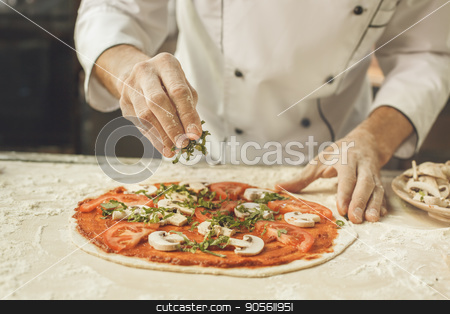 To use this stock image in your creative project, please select the size you need over to the right and click the "Add to Cart" button.
Your downloaded image will come with the Cutcaster watermark removed so don’t worry about the watermark you see on this page. Bakery chef cooking bake in the kitchen professional stock photo, Bakery chef cooking bake in the kitchen professional making pizza by Dmytro Sidelnikov