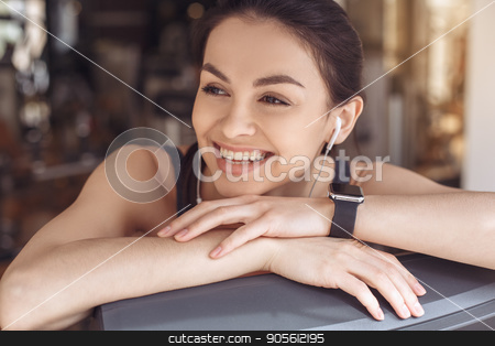 To use this stock image in your creative project, please select the size you need over to the right and click the "Add to Cart" button.
Your downloaded image will come with the Cutcaster watermark removed so don’t worry about the watermark you see on this page. Young woman workout in gym healthy lifestyle stock photo, Young female training in gym healthy lifestyle listening music by Dmytro Sidelnikov