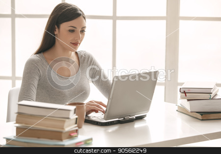 To use this stock image in your creative project, please select the size you need over to the right and click the "Add to Cart" button.
Your downloaded image will come with the Cutcaster watermark removed so don’t worry about the watermark you see on this page. Young woman study at home alone education stock photo, Young woman study at home alone using digital device by Dmytro Sidelnikov