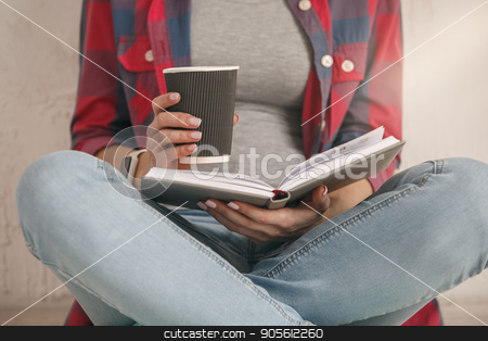 To use this stock image in your creative project, please select the size you need over to the right and click the "Add to Cart" button.
Your downloaded image will come with the Cutcaster watermark removed so don’t worry about the watermark you see on this page. Young woman with a book studio portrait stock photo, Young female with a book isolated on white reading by Dmytro Sidelnikov