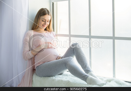 To use this stock image in your creative project, please select the size you need over to the right and click the "Add to Cart" button.
Your downloaded image will come with the Cutcaster watermark removed so don’t worry about the watermark you see on this page. Young preganant woman expecting a baby happy parent stock photo, Young preganant woman expecting a baby happy parent near window by Dmytro Sidelnikov