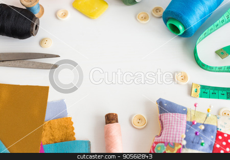 To use this stock image in your creative project, please select the size you need over to the right and click the "Add to Cart" button.
Your downloaded image will come with the Cutcaster watermark removed so don’t worry about the watermark you see on this page. needlework, craft, sewing and tailoring concept - tools close-up on white desk, measuring meter, pink, blue and black thread spools, scraps of colorful fabric, pin and pincushion, white buttons, soap. stock photo, needlework, craft, sewing and tailoring concept - tools close-up on white desk, measuring meter, pink, blue and black thread spools, scraps of colorful fabric, pins and pincushion, white buttons, soap by Dmitry