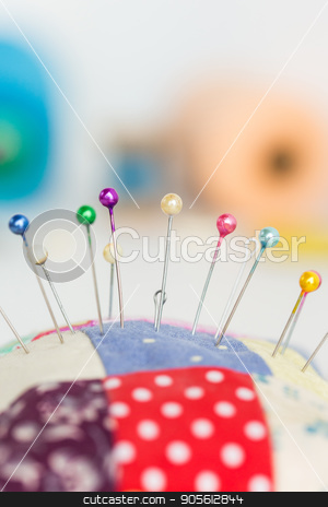 To use this stock image in your creative project, please select the size you need over to the right and click the "Add to Cart" button.
Your downloaded image will come with the Cutcaster watermark removed so don’t worry about the watermark you see on this page. closeup sewing tools, patchwork, tailoring and fashion concept - macro with colorful stitched pincushion and many beautiful pins, background skeins of pink and blue thread, selective focus, vertical. stock photo, closeup sewing tools, patchwork, tailoring and fashion concept - macro with colorful stitched pincushion and many beautiful pins, background skeins of pink and blue thread, selective focus, vertical by Dmitry