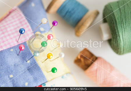 To use this stock image in your creative project, please select the size you need over to the right and click the "Add to Cart" button.
Your downloaded image will come with the Cutcaster watermark removed so don’t worry about the watermark you see on this page. needlework, craft, sewing and tailoring concept - macro with beautiful stitched pincushion and colorful pins, pink, blue and green thread spools, white background, selective focus. stock photo, needlework, craft, sewing and tailoring concept - macro with beautiful stitched pincushion and colorful pins, pink, blue and green thread spools, white background, selective focus by Dmitry