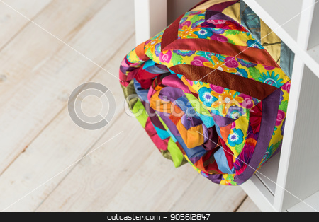 To use this stock image in your creative project, please select the size you need over to the right and click the "Add to Cart" button.
Your downloaded image will come with the Cutcaster watermark removed so don’t worry about the watermark you see on this page. patchwork, sewing and fashion concept - bright colorful quilt at white shelves with storage compartment in store, white floor in a warehouse of finished stitched textile products, top view. stock photo, patchwork, sewing and fashion concept - bright colorful quilt at white shelves with storage compartment in store, white floor in a warehouse of finished stitched textile products, top view. by Dmitry