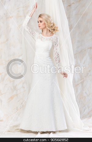 To use this stock image in your creative project, please select the size you need over to the right and click the "Add to Cart" button.
Your downloaded image will come with the Cutcaster watermark removed so don’t worry about the watermark you see on this page. fashionable dress, beautiful blonde model, bride hairstyle and makeup concept - glamour young woman in wedding white gown standing indoors on light background, slim female posing near curtains. stock photo, fashionable dress, beautiful blonde model, bride hairstyle and makeup concept - glamour young woman in wedding white gown standing indoors on light background, slim female posing near curtains by Dmitry