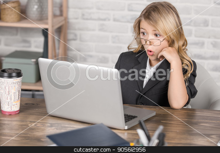 To use this stock image in your creative project, please select the size you need over to the right and click the "Add to Cart" button.
Your downloaded image will come with the Cutcaster watermark removed so don’t worry about the watermark you see on this page. Little Girl Using Digital Device Modern Technology stock photo, Little girl sitting using laptop modern technology by Dmytro Sidelnikov