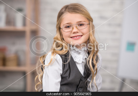To use this stock image in your creative project, please select the size you need over to the right and click the "Add to Cart" button.
Your downloaded image will come with the Cutcaster watermark removed so don’t worry about the watermark you see on this page. Little Girl Student School Uniform Style Education Concept stock photo, Little girl school uniform smart student style by Dmytro Sidelnikov