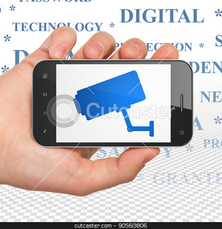 To use this stock image in your creative project, please select the size you need over to the right and click the "Add to Cart" button.
Your downloaded image will come with the Cutcaster watermark removed so don’t worry about the watermark you see on this page. Privacy concept: Hand Holding Smartphone with Cctv Camera on display stock photo, Privacy concept: Hand Holding Smartphone with blue Cctv Camera icon on display, Tag Cloud background, 3D rendering by mkabakov