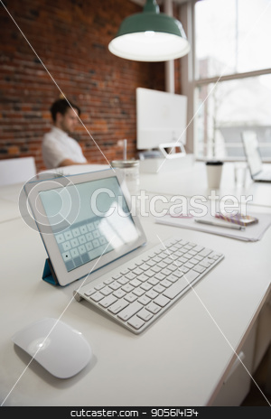 To use this stock image in your creative project, please select the size you need over to the right and click the "Add to Cart" button.
Your downloaded image will come with the Cutcaster watermark removed so don’t worry about the watermark you see on this page. Digital tablet on desk stock photo, Digital tablet on desk in office by Wavebreak Media