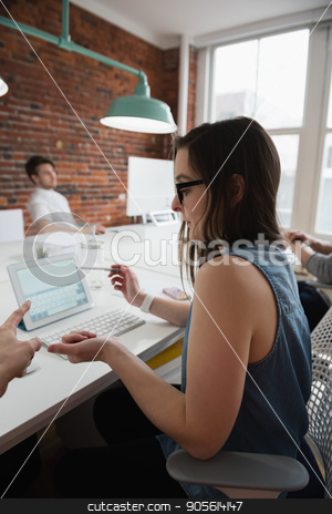 To use this stock image in your creative project, please select the size you need over to the right and click the "Add to Cart" button.
Your downloaded image will come with the Cutcaster watermark removed so don’t worry about the watermark you see on this page. Executives discussing over laptop stock photo, Executives discussing over laptop in office by Wavebreak Media