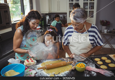 To use this stock image in your creative project, please select the size you need over to the right and click the "Add to Cart" button.
Your downloaded image will come with the Cutcaster watermark removed so don’t worry about the watermark you see on this page. Family preparing dessert in kitchen stock photo, Family preparing dessert in kitchen at home by Wavebreak Media