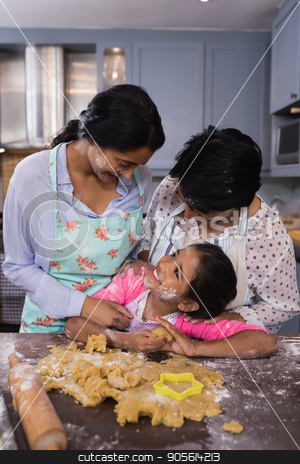 To use this stock image in your creative project, please select the size you need over to the right and click the "Add to Cart" button.
Your downloaded image will come with the Cutcaster watermark removed so don’t worry about the watermark you see on this page. Smiling multi-generation family standing by dough in kitchen stock photo, Smiling multi-generation family standing by dough in kitchen at home by Wavebreak Media