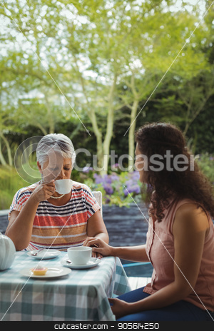 To use this stock image in your creative project, please select the size you need over to the right and click the "Add to Cart" button.
Your downloaded image will come with the Cutcaster watermark removed so don’t worry about the watermark you see on this page. Mother and daughter having tea stock photo, Mother and daughter having tea at home by Wavebreak Media