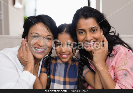 To use this stock image in your creative project, please select the size you need over to the right and click the "Add to Cart" button.
Your downloaded image will come with the Cutcaster watermark removed so don’t worry about the watermark you see on this page. Portrait of smiling multi-generation family stock photo, Portrait of smiling multi-generation family at home by Wavebreak Media