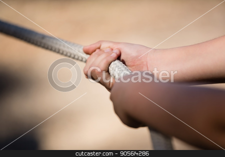 To use this stock image in your creative project, please select the size you need over to the right and click the "Add to Cart" button.
Your downloaded image will come with the Cutcaster watermark removed so don’t worry about the watermark you see on this page. Hands of kid practicing tug of war during obstacle course stock photo, Hands of kid practicing tug of war during obstacle course in the boot camp by Wavebreak Media