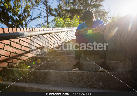To use this stock image in your creative project, please select the size you need over to the right and click the "Add to Cart" button.
Your downloaded image will come with the Cutcaster watermark removed so don’t worry about the watermark you see on this page. Upset woman sitting on staircase in the boot camp stock photo, Upset woman sitting on staircase in the boot camp on a sunny day by Wavebreak Media