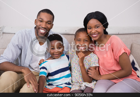 To use this stock image in your creative project, please select the size you need over to the right and click the "Add to Cart" button.
Your downloaded image will come with the Cutcaster watermark removed so don’t worry about the watermark you see on this page. Happy family sitting on sofa at home stock photo, Portrait of happy family sitting on sofa at home by Wavebreak Media