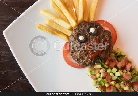 To use this stock image in your creative project, please select the size you need over to the right and click the "Add to Cart" button.
Your downloaded image will come with the Cutcaster watermark removed so don’t worry about the watermark you see on this page. Funny meat cutlet face stock photo, Funny meat cutlet face with french fries as hair and cutted vegetables for children menu by olinchuk