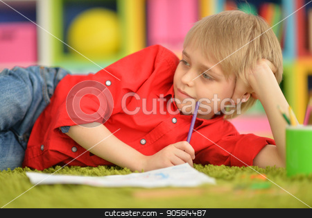 To use this stock image in your creative project, please select the size you need over to the right and click the "Add to Cart" button.
Your downloaded image will come with the Cutcaster watermark removed so don’t worry about the watermark you see on this page. Cute boy drawing with pencils stock photo, Portrait of a cute boy drawing with pencils by Ruslan Huzau