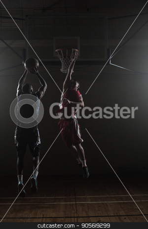 To use this stock image in your creative project, please select the size you need over to the right and click the "Add to Cart" button.
Your downloaded image will come with the Cutcaster watermark removed so don’t worry about the watermark you see on this page. Basketball player shooting a basketball with a defender stock photo, Basketball player shooting while a defender trying to block him in a gymnasium by Wavebreak Media