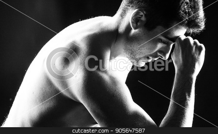 To use this stock image in your creative project, please select the size you need over to the right and click the "Add to Cart" button.
Your downloaded image will come with the Cutcaster watermark removed so don’t worry about the watermark you see on this page. Dramatic close-up of a man thinking with a fist on his forehead stock photo, Black and white dramatic close-up of a man thinking with a fist on his forehead emerging from a black background by Evan Sharboneau