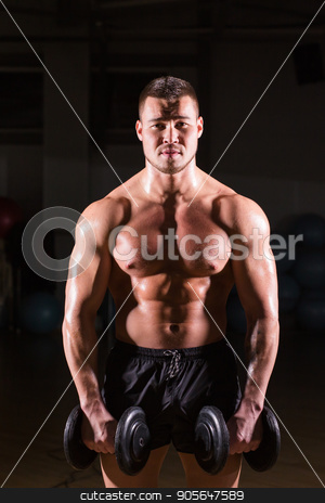 To use this stock image in your creative project, please select the size you need over to the right and click the "Add to Cart" button.
Your downloaded image will come with the Cutcaster watermark removed so don’t worry about the watermark you see on this page. Muscular bodybuilder guy doing exercises with dumbbells. stock photo, Muscular bodybuilder guy doing exercises with dumbbells over black background by Satura86