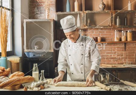 To use this stock image in your creative project, please select the size you need over to the right and click the "Add to Cart" button.
Your downloaded image will come with the Cutcaster watermark removed so don’t worry about the watermark you see on this page. Bakery chef cooking bake in the kitchen professional stock photo, Bakery chef cooking bake in the kitchen professional making roll by Dmytro Sidelnikov