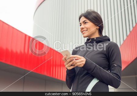 To use this stock image in your creative project, please select the size you need over to the right and click the "Add to Cart" button.
Your downloaded image will come with the Cutcaster watermark removed so don’t worry about the watermark you see on this page. Young woman active exercise workout on street outdoor stock photo, Young female active exercise workout on street outside using smartphone by Dmytro Sidelnikov