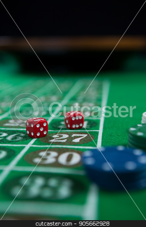 To use this stock image in your creative project, please select the size you need over to the right and click the "Add to Cart" button.
Your downloaded image will come with the Cutcaster watermark removed so don’t worry about the watermark you see on this page. Close-up of dices and chips stock photo, Close-up of dices and chips on roulette table by Wavebreak Media