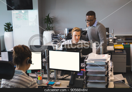 To use this stock image in your creative project, please select the size you need over to the right and click the "Add to Cart" button.
Your downloaded image will come with the Cutcaster watermark removed so don’t worry about the watermark you see on this page. Focused young business colleagues working at office stock photo, Focused young business colleagues working at desk in office by Wavebreak Media