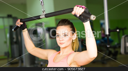 To use this stock image in your creative project, please select the size you need over to the right and click the "Add to Cart" button.
Your downloaded image will come with the Cutcaster watermark removed so don’t worry about the watermark you see on this page. health, fitness, lifestyle, technology and people concept - Sportive young woman in a gym training. Working out in a sport club stock photo, Sportive young woman in a gym training. Working out in a fitness gym. by Satura86