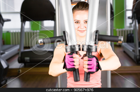 To use this stock image in your creative project, please select the size you need over to the right and click the "Add to Cart" button.
Your downloaded image will come with the Cutcaster watermark removed so don’t worry about the watermark you see on this page. health, fitness, lifestyle, technology and people concept - Sportive young woman in a gym training. Working out in a sport club stock photo, Sportive young woman in a gym training. Working out in a fitness gym. by Satura86