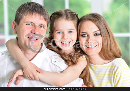 To use this stock image in your creative project, please select the size you need over to the right and click the "Add to Cart" button.
Your downloaded image will come with the Cutcaster watermark removed so don’t worry about the watermark you see on this page. girl posing with her parents stock photo, Close up portrait of cute little girl posing with her parents by Ruslan Huzau